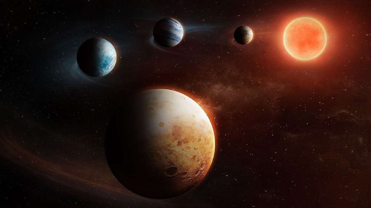 An artist's impression shows the "inside out" planetary system around the star LHS 1903.