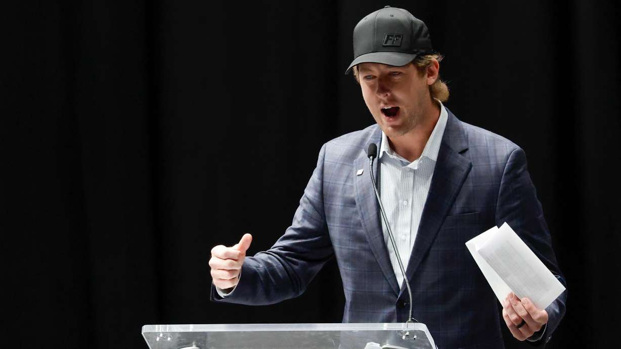 Garrett Mitchell speaks at the memorial service for former NASCAR driver Greg Biffle and his family in Charlotte, N.C., Friday, Jan. 16, 2026.