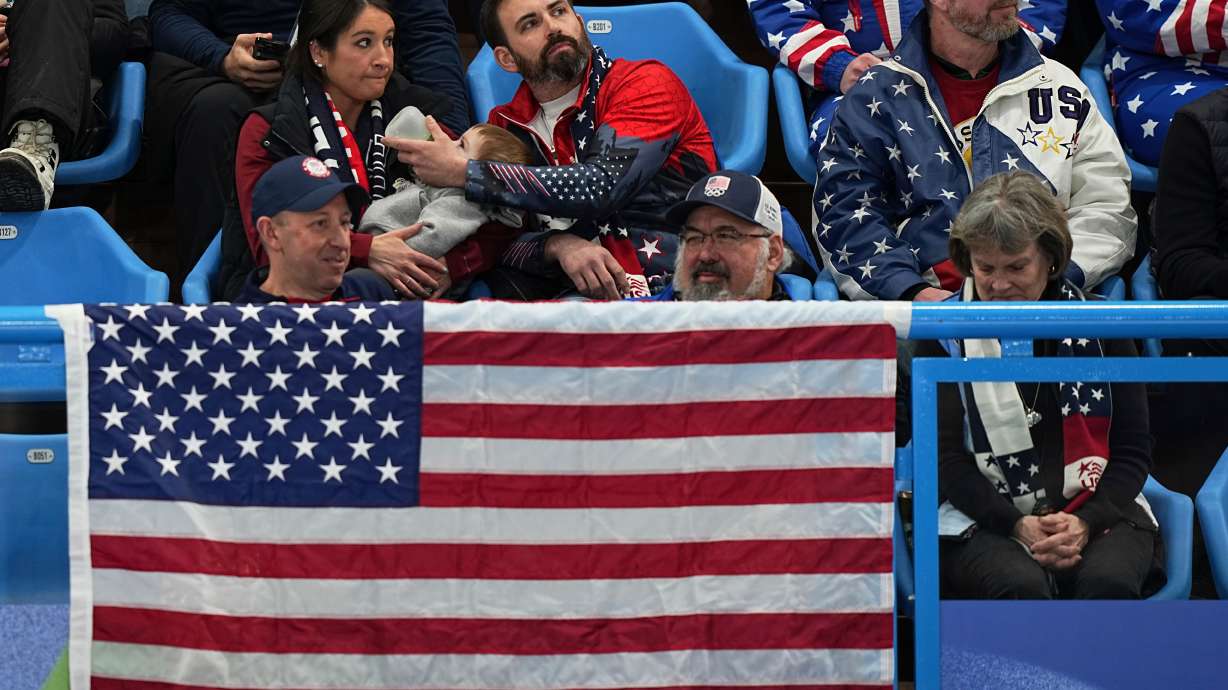 US supporters watch during the gold medal mixed doubles curling match between USA and Sweden, at the 2026 Winter Olympics, in Cortina D'Ampezzo, Italy, Tuesday, Feb. 10, 2026.