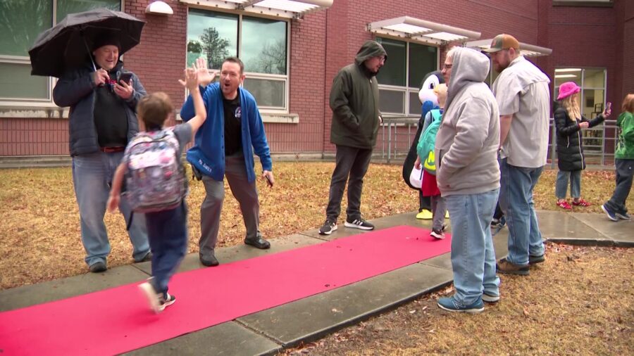 Millcreek elementary students get red carpet welcome from local dads