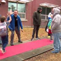 Millcreek elementary students get red carpet welcome from local dads