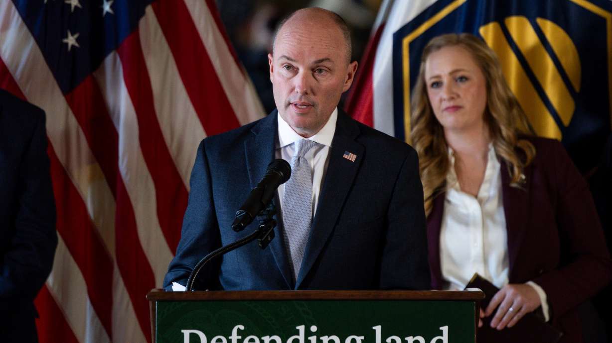 Utah Gov. Spencer Cox speaks in the Gold Room at the Capitol in Salt Lake City on Thursday. A Chinese company has been forced to sell a Tooele County motorsports park, Cox announced.