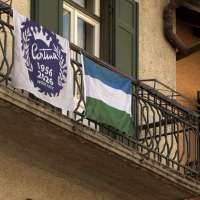 Traditional Ladin flags fly in Cortina for the Games