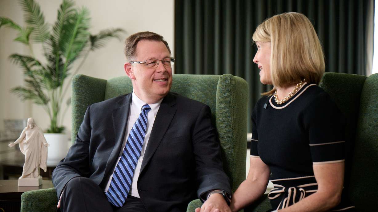 Elder Clark G. Gilbert and his wife, Christine, speak about his new call to the Quorum of the Twelve Apostles from the Joseph Smith Memorial Building on Temple Square in Salt Lake City on Thursday.