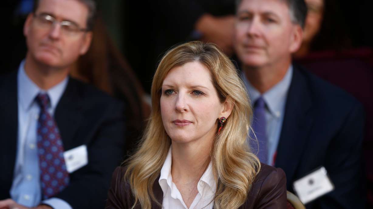 Then-White House counsel Kathryn Ruemmler at FBI Headquarters, in Washington, Oct. 28, 2013. Ruemmler announced her resignation from Goldman Sachs on Thursday over her ties to Jeffrey Epstein.