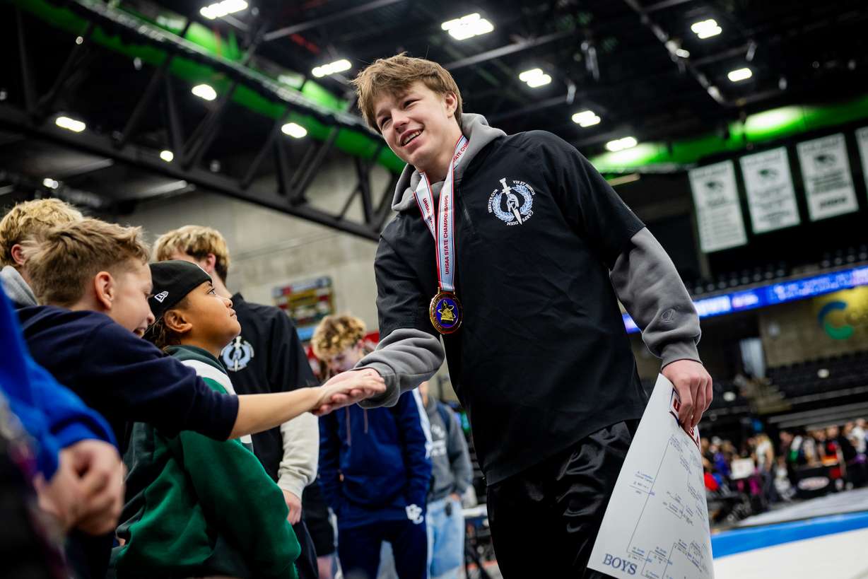 Layton's Noah Bull wins first place in the 6A boys wrestling state championships' 150-pound class at the UCCU Center in Orem on Thursday, Feb. 12, 2026.
