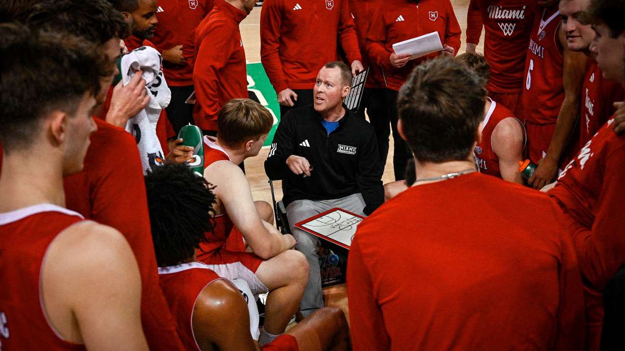 Miami (Ohio) Head Coach Travis Steele talks to his team during the second half of an NCAA college Basketball game against Marshall, Saturday, Feb. 7, 2026, in Huntington, W.Va.