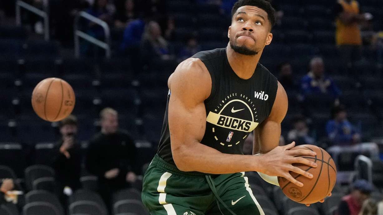 FILE - Milwaukee Bucks forward Giannis Antetokounmpo warms up before an NBA basketball game against the Golden State Warriors in San Francisco, Jan. 7, 2026.