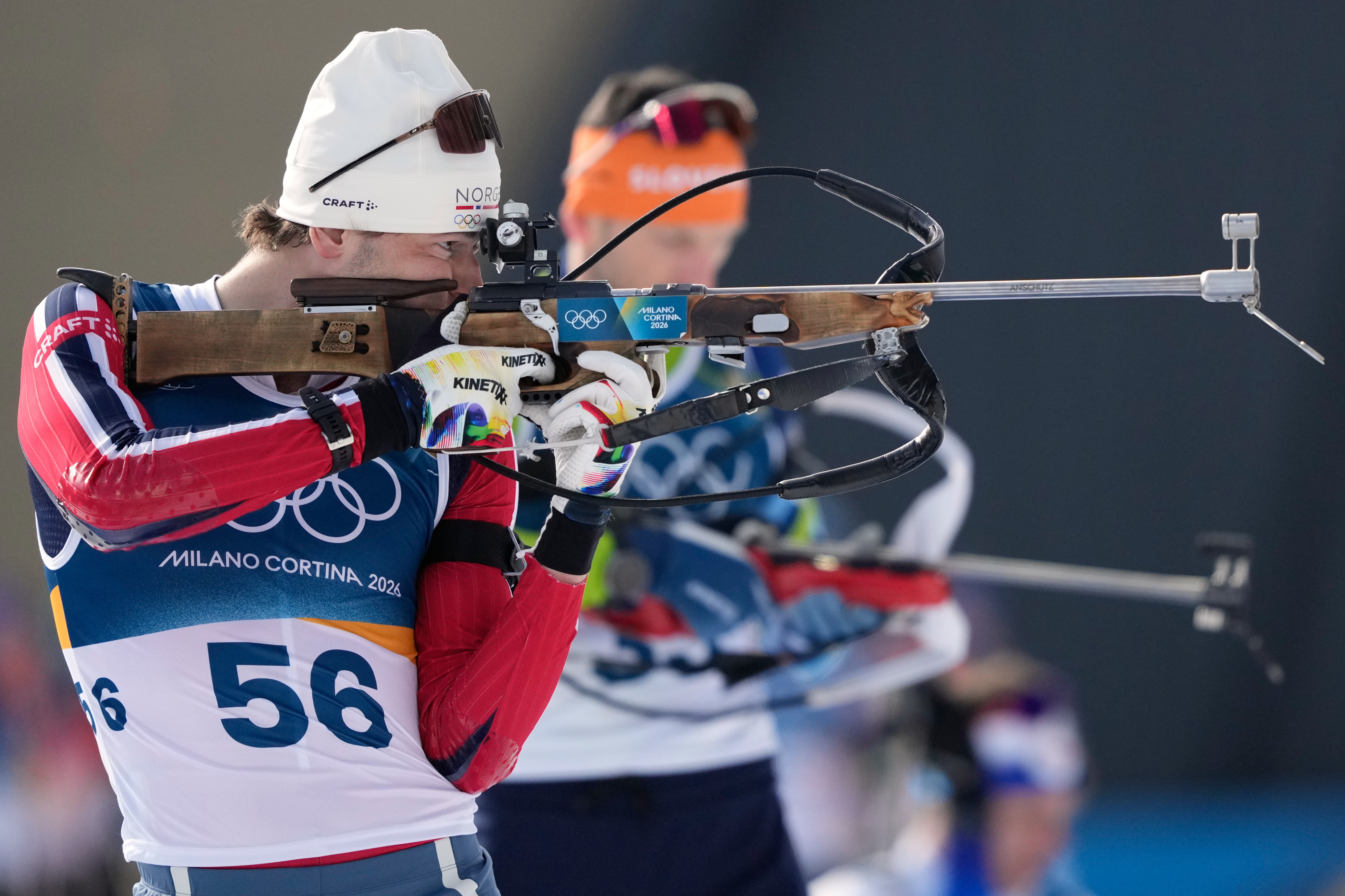 Sturla Holm Laegreid, of Norway, shoots ahead of the men's 10-kilometer sprint biathlon race at the 2026 Winter Olympics in Anterselva, Italy, Friday, Feb. 13, 2026. 