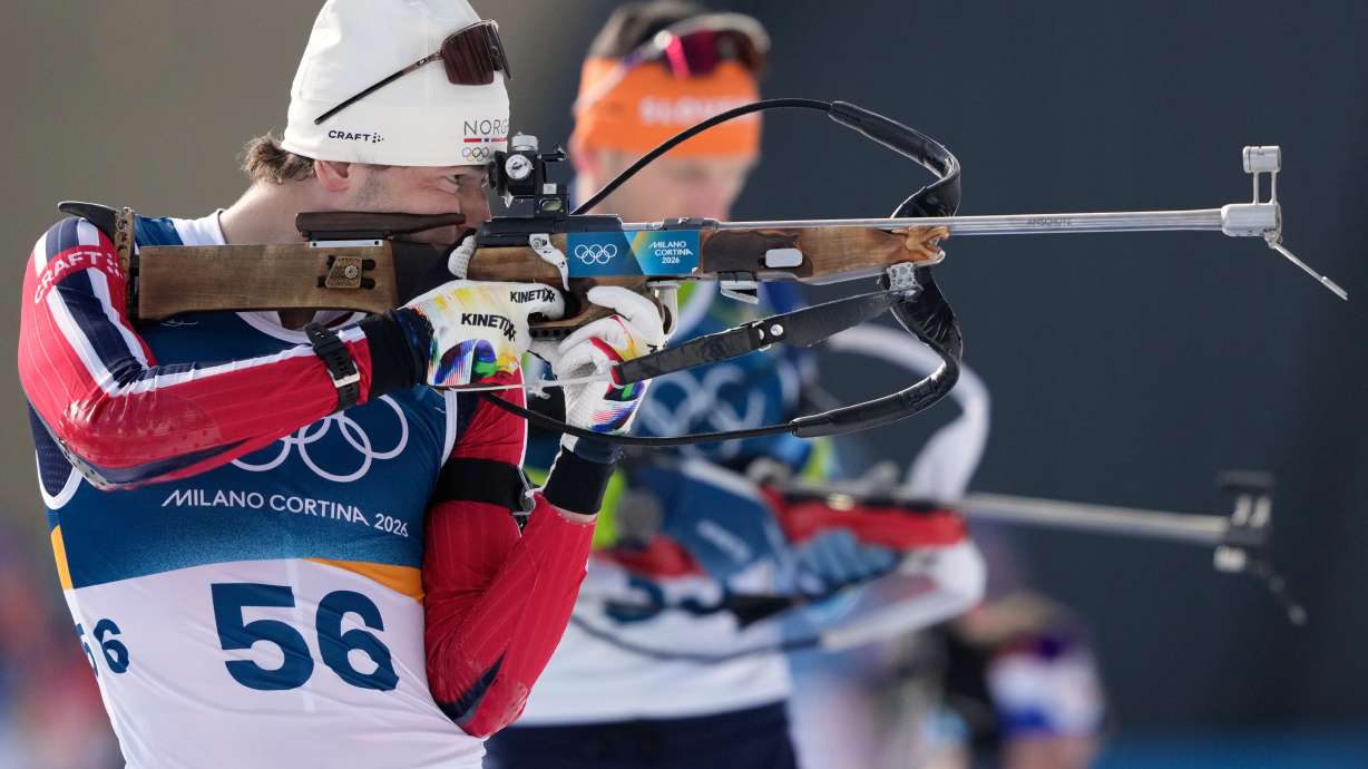Sturla Holm Laegreid, of Norway, shoots ahead of the men's 10-kilometer sprint biathlon race at the 2026 Winter Olympics in Anterselva, Italy, Friday, Feb. 13, 2026.