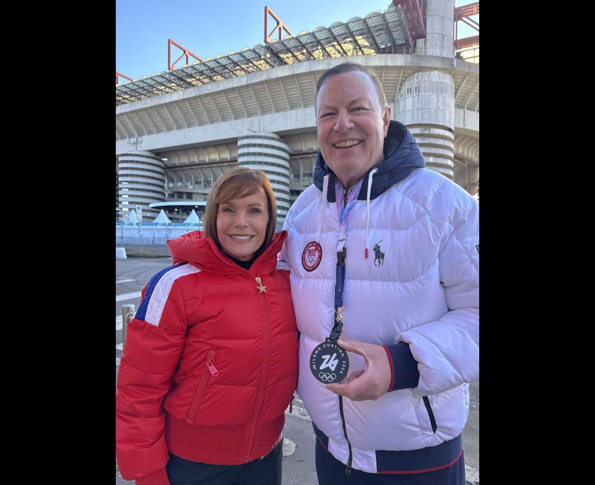 Everen Brown is given a medal to celebrate his Olympic dedication.