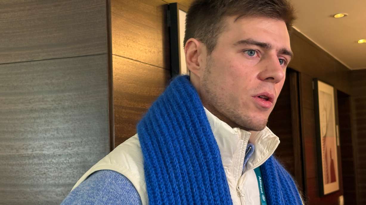 Ukrainian skeleton athlete Vladyslav Heraskevych speaks to the media amid an ongoing appeal hearing in Milan, Italy, Friday, Feb. 13, 2026.