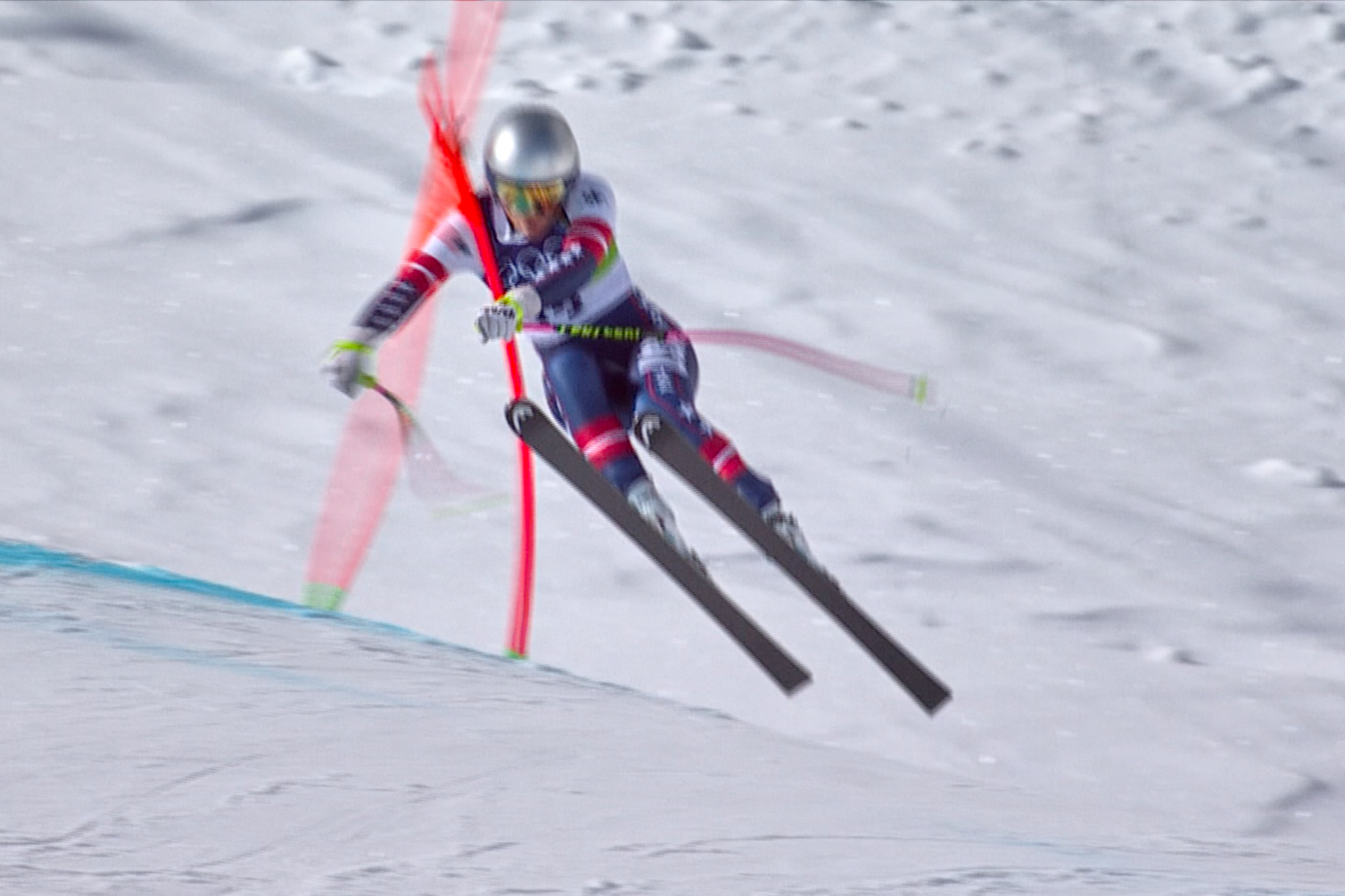 In this image taken from video provided by Olympic Broadcasting Services, OBS, United States' Lindsey Vonn crashes during an alpine ski women's downhill race, at the 2026 Winter Olympics, in Cortina d'Ampezzo, Italy, Sunday, Feb. 8, 2026. 