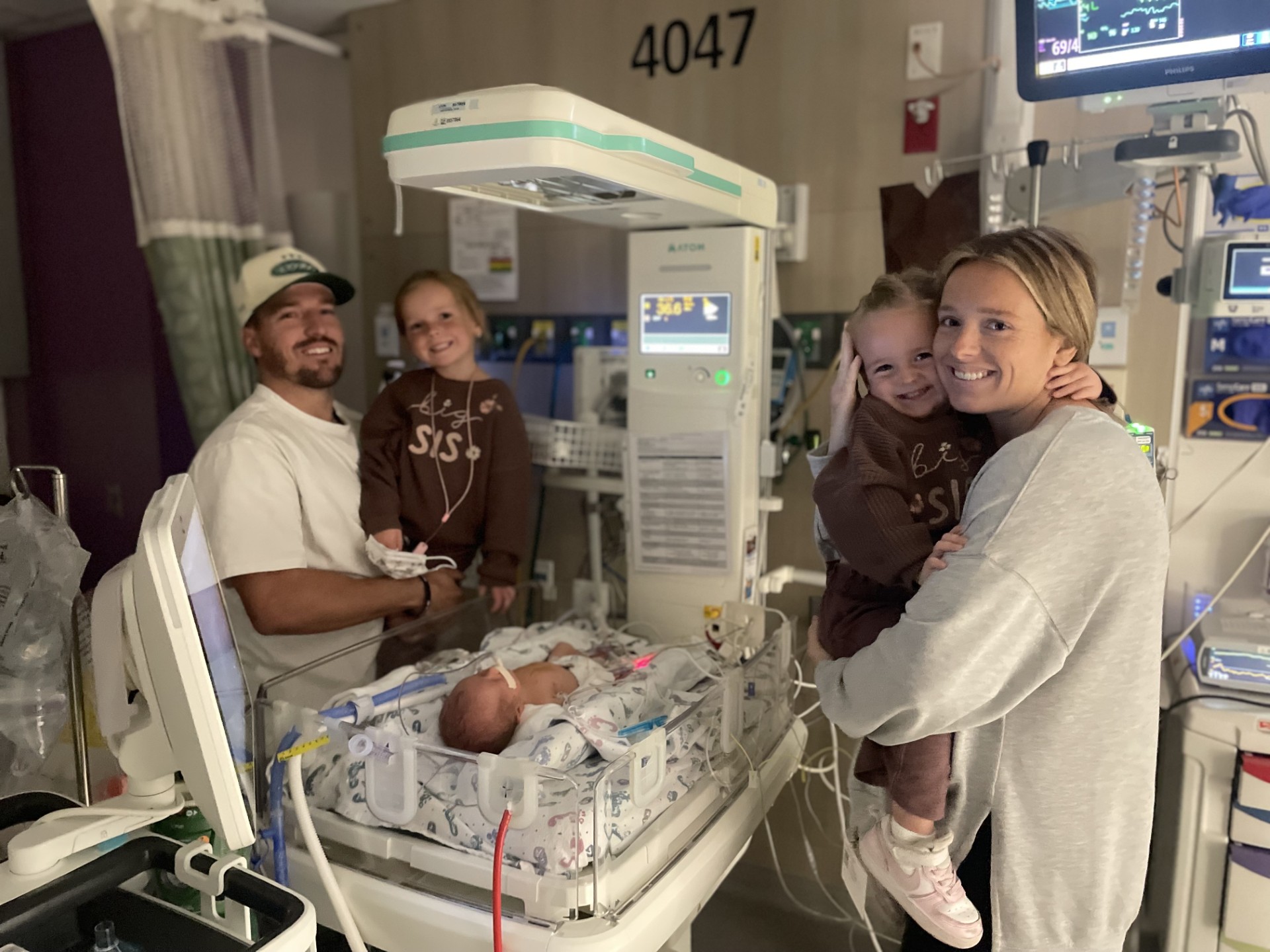 Nash Child in the hospital with his family. Nash was flown to a hospital by medical helicopter after his birth and doctors diagnosed him with an overinflated lung, that later became a Stage 4 laryngeal cleft.