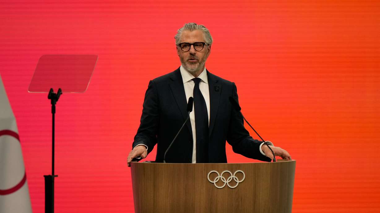 FILE - Casey Wasserman, Chairman of the Los Angeles Organizing Committee for the 2028 Olympic and Paralympic Games speaks during an IOC meeting ahead of the 2026 Winter Olympics, in Milan, Italy, Tuesday, Feb. 3, 2026.