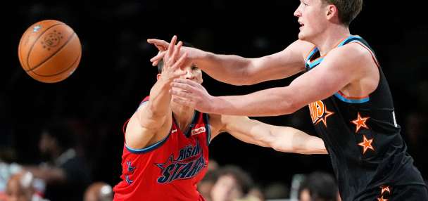 Heat's Keshad Johnson soars to a slam dunk title, edging Carter Bryant who had a perfect score