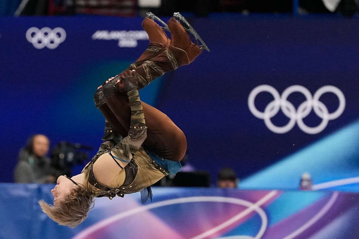 Ilia Malinin of the United States does a back flip while competing during the men's figure skating short program at the 2026 Winter Olympics, in Milan, Italy, Tuesday.