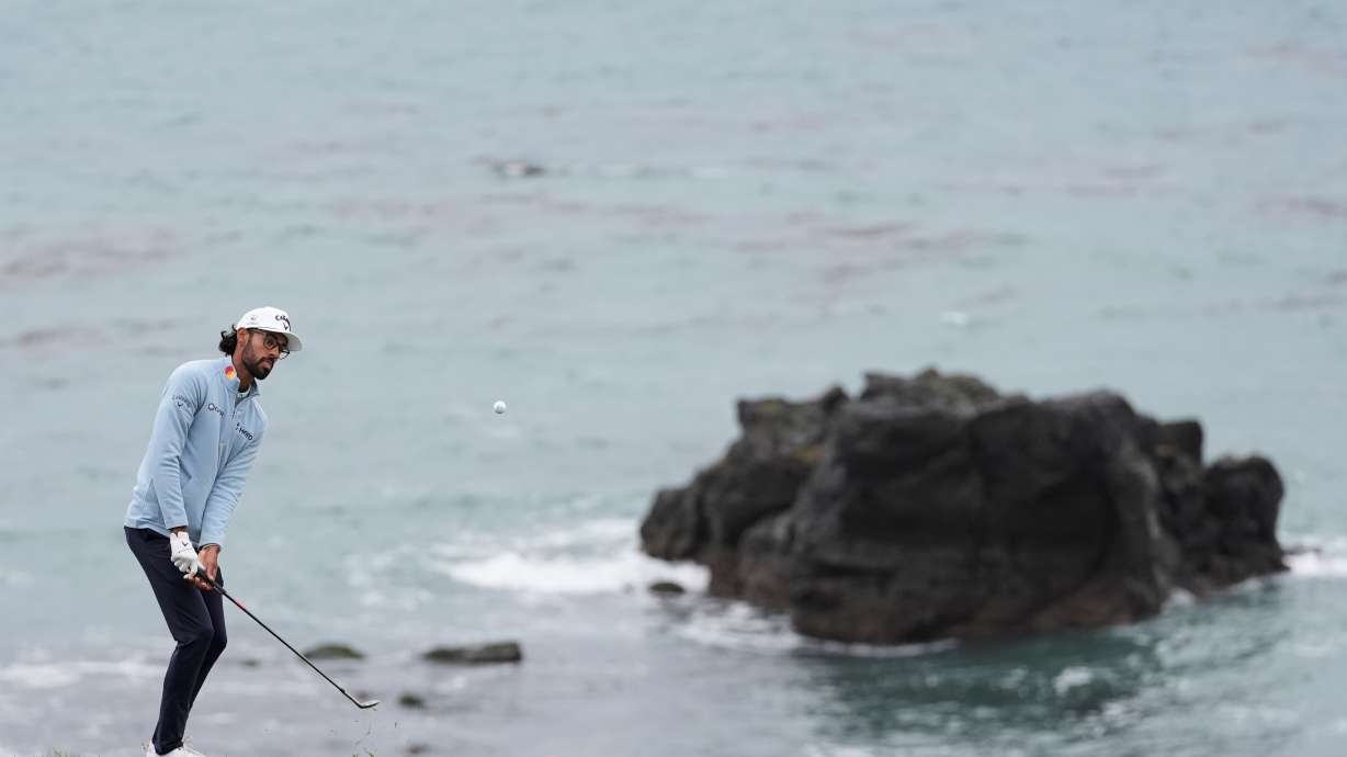 Akshay Bhatia putts to the eighth green at Pebble Beach Golf Links during the third round of the AT&T Pebble Beach Pro-Am golf tournament, Saturday, Feb. 14, 2026, in Pebble Beach, Calif.