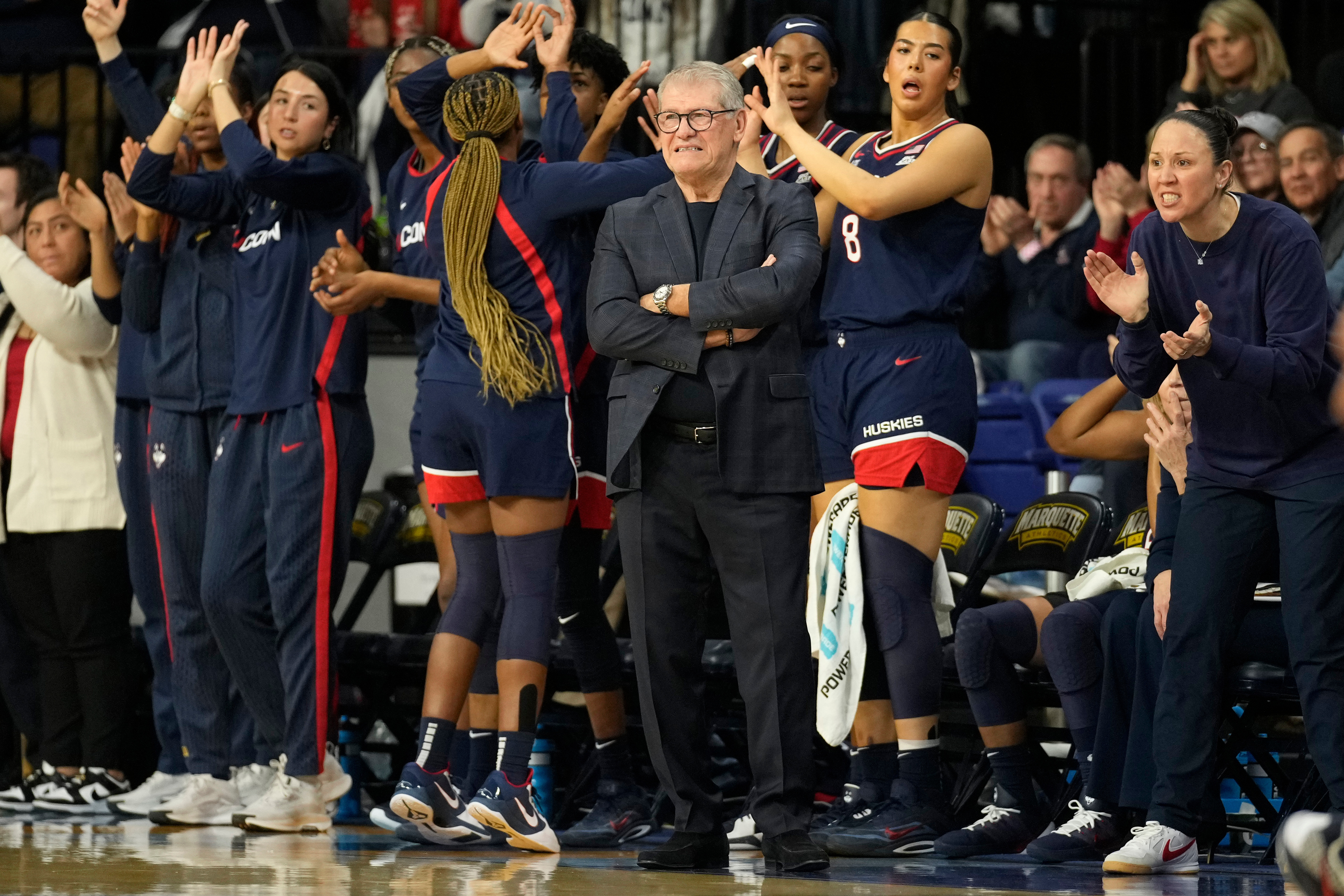 UConn head coach Geno Auriemma looks on during the first half of an NCAA college basketball game against Marquette, Saturday, Feb. 14, 2026, in Milwaukee. 