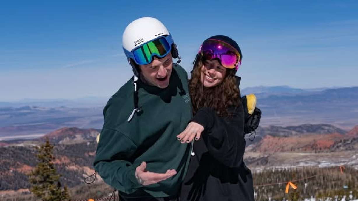 Dallas Insheiwat and Aubrie Rammell, from St. George, at the top of the Giant Steps lift at Brian Head Resort, Saturday. Insheiwat proposed to Rammell at the resort's speed dating event.
