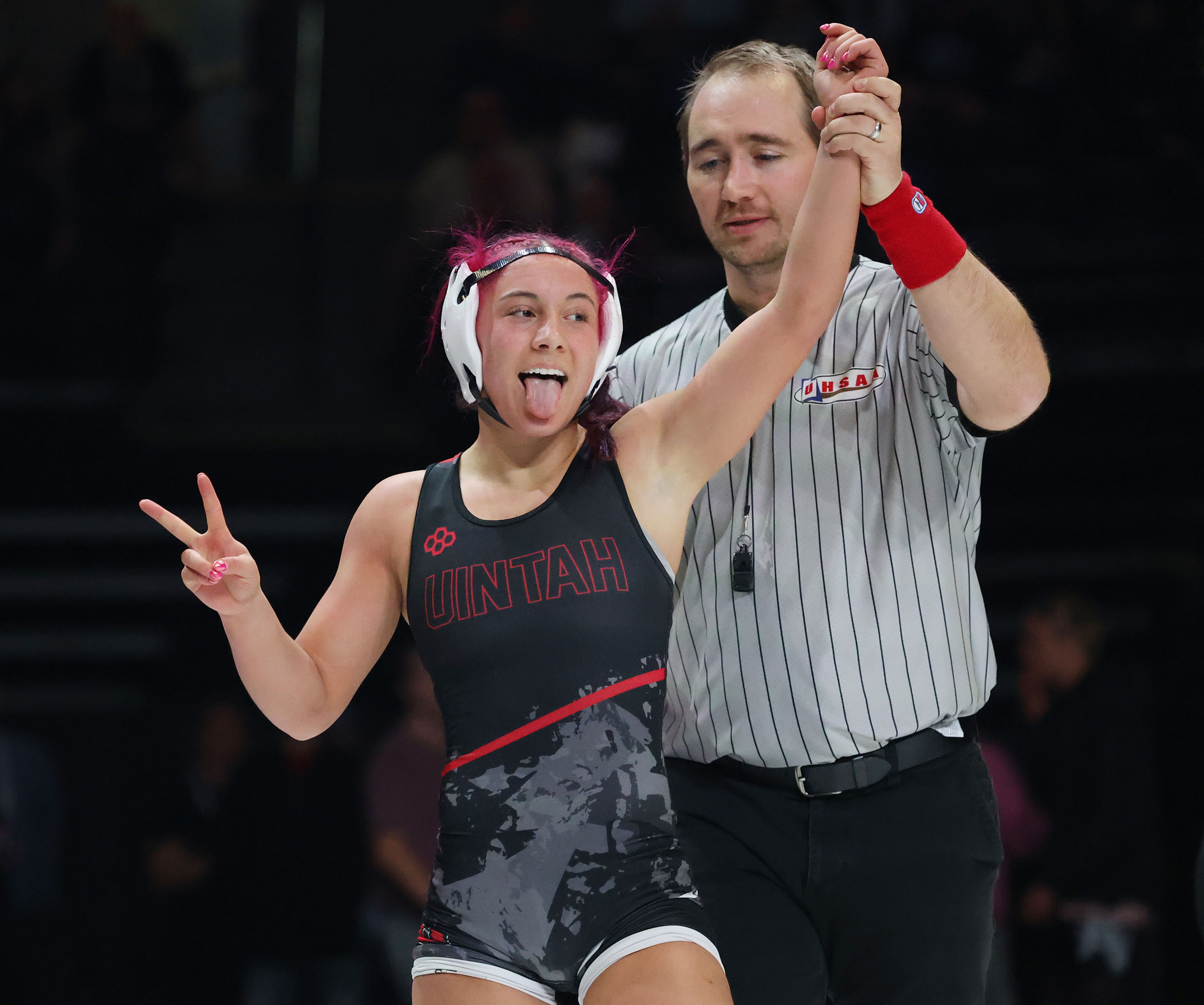 Wrestlers compete during the 4A State Championship at the UCCU Event Center in Orem on Saturday, Feb. 14, 2026.