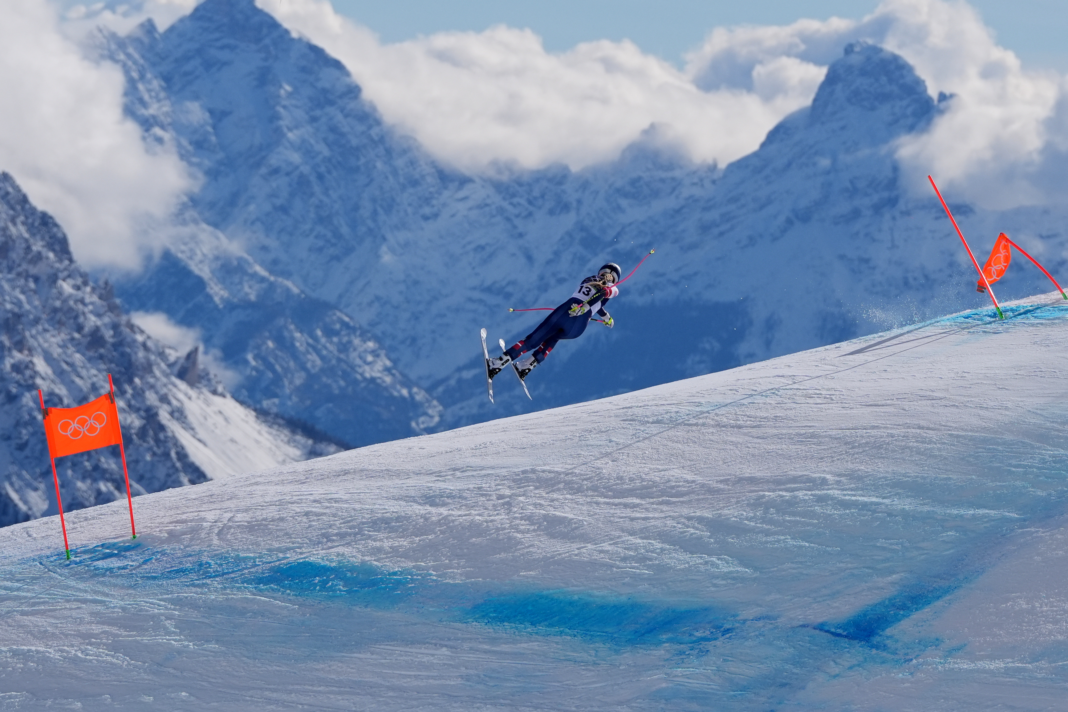 United States' Lindsey Vonn crashes during an alpine ski women's downhill race, at the 2026 Winter Olympics, in Cortina d'Ampezzo, Italy, Sunday, Feb. 8, 2026.