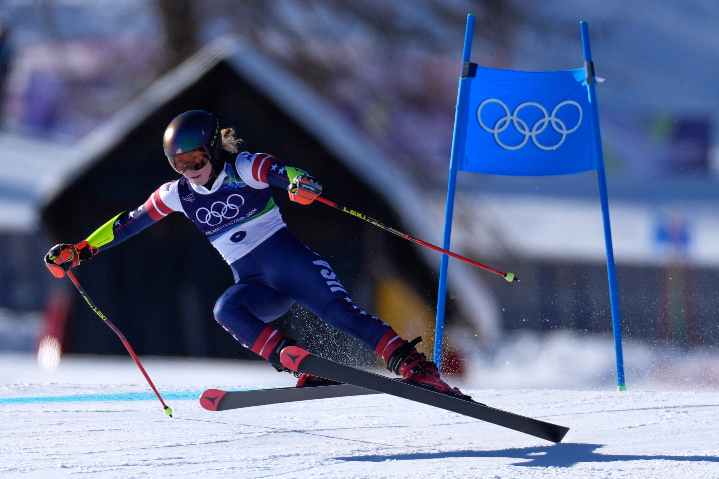United States' Mikaela Shiffrin speeds down the course, during an alpine ski, women's giant slalom race, at the 2026 Winter Olympics, in Cortina d'Ampezzo, Italy, Sunday, Feb. 15, 2026. 