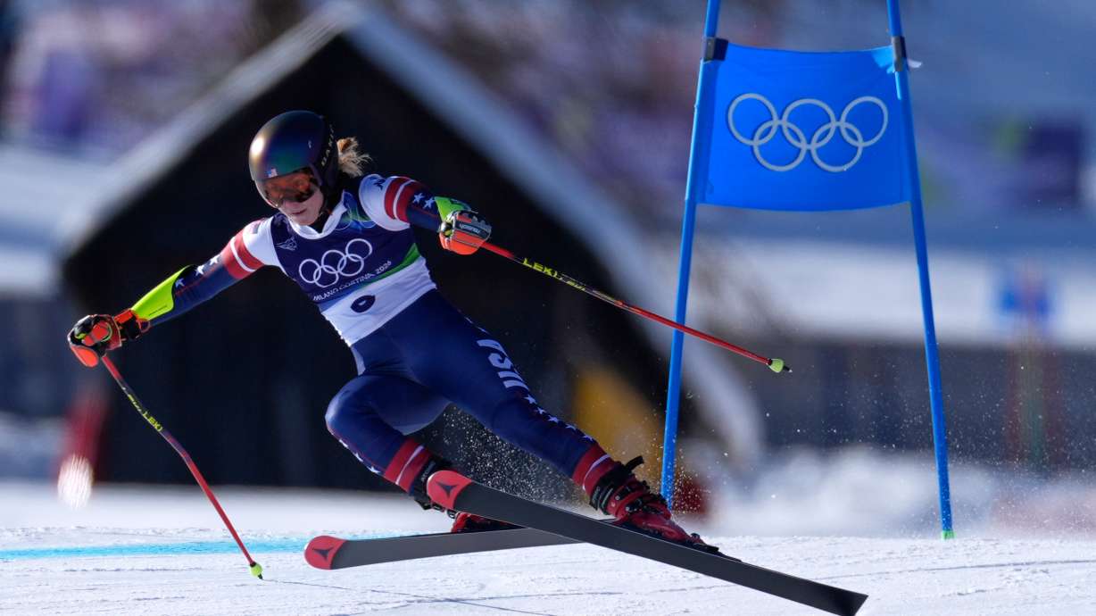 United States' Mikaela Shiffrin speeds down the course, during an alpine ski, women's giant slalom race, at the 2026 Winter Olympics, in Cortina d'Ampezzo, Italy, Sunday, Feb. 15, 2026.