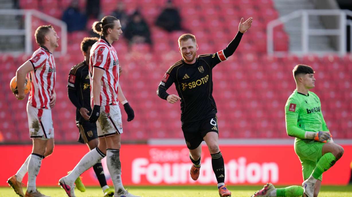 Fulham's Harrison Reed celebrates after scoring his sides second goal during the English FA Cup fourth round match between Stoke City and Fulham, in Stoke, England, Sunday, Feb. 15, 2026.