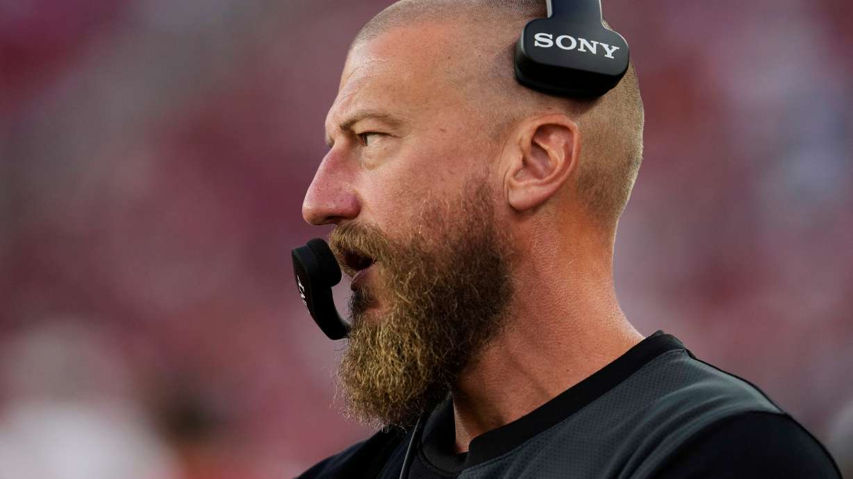 FILE - San Francisco 49ers run game coordinator/tight ends coach Brian Fleury, now offensive coordinator for the Seattle Seahawks, watches from the sideline during the second half of an NFL preseason football game against the Los Angeles Chargers, Aug. 23, 2025, in Santa Clara, Calif.