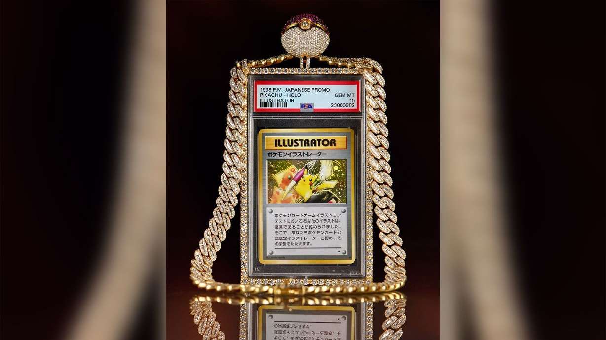 The Pikachu Illustrator card was auctioned along with the custom diamond necklace Logan Paul famously wore at WrestleMania38.