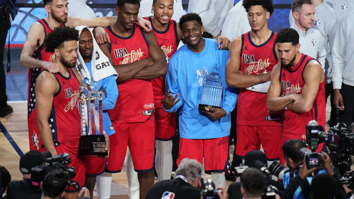 USA Stars pose for photos after a win over USA Stripes in the NBA All-Star basketball game Sunday, Feb. 15, 2026, in Inglewood, Calif.