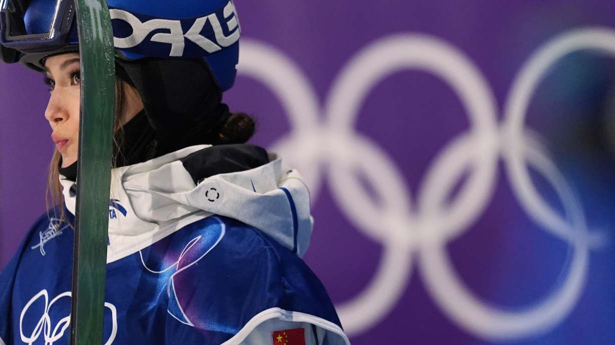 China's Eileen Gu waits for her scores as she competes in the women's freestyle skiing big air qualifications at the 2026 Winter Olympics, in Livigno, Italy, Saturday, Feb. 14, 2026.