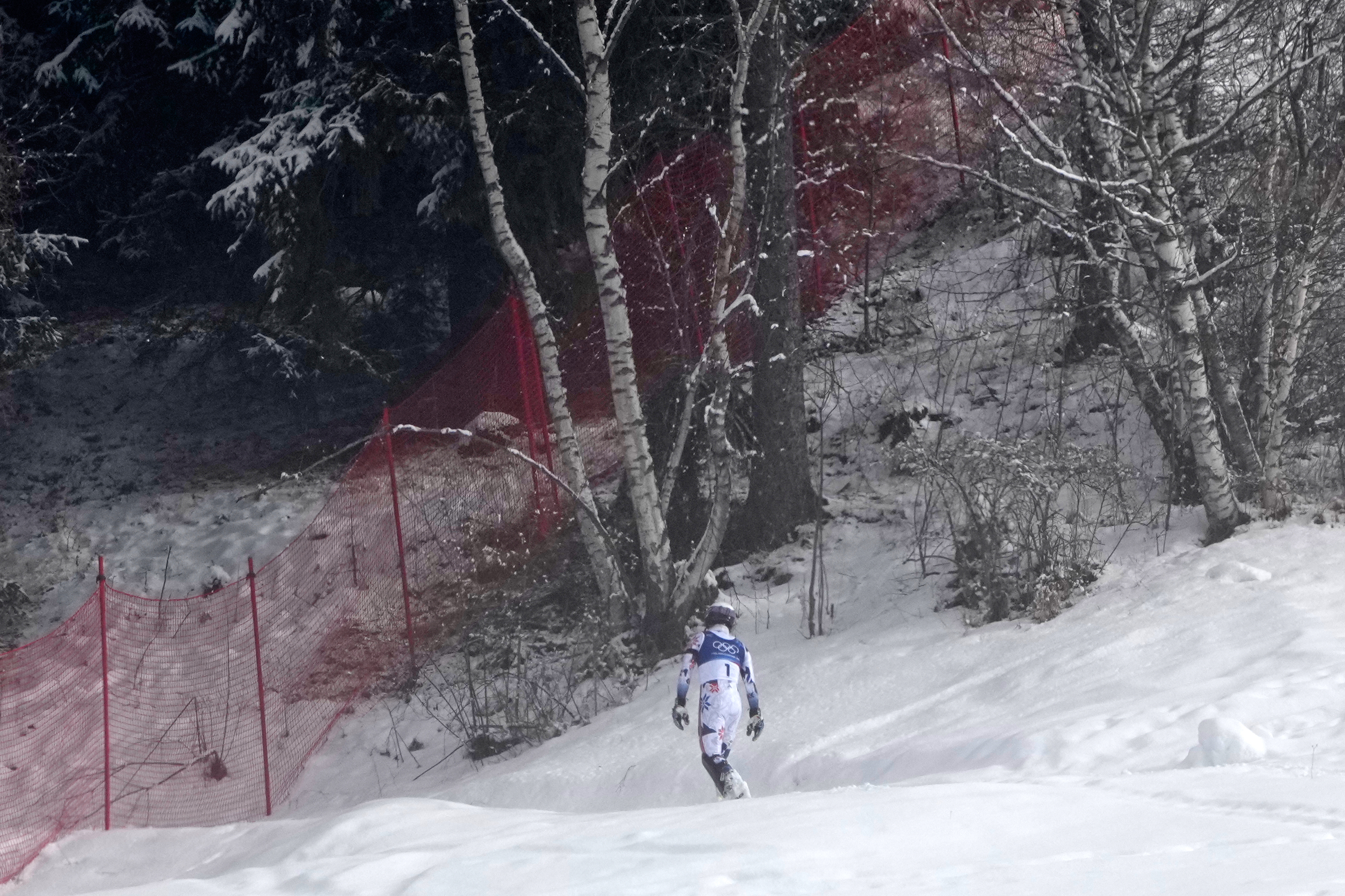Norway's Atle Lie McGrath walks off the course after skiing out during an alpine ski, men's slalom race, at the 2026 Winter Olympics, in Bormio, Italy, Monday, Feb. 16, 2026. 