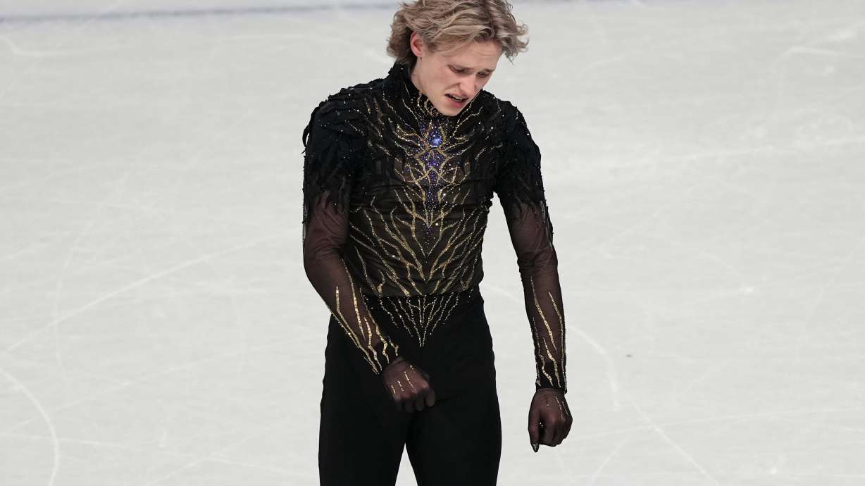 Ilia Malinin of the United States reacts at the end of his program after competing during the men's free skate program in figure skating at the 2026 Winter Olympics, in Milan, Italy, Friday, Feb. 13, 2026.