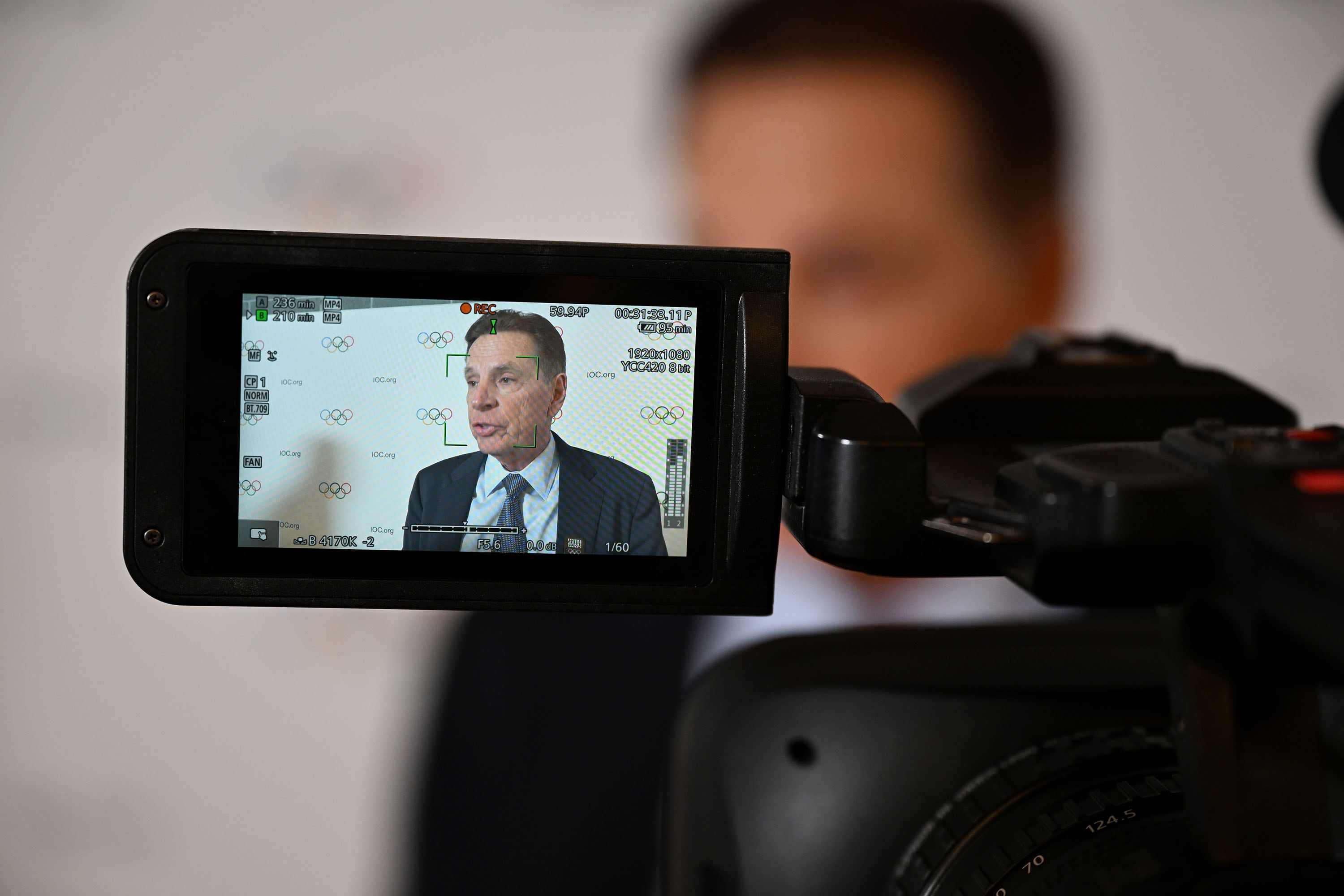 Fraser Bullock, executive chair and president of Olympic Winter Games Utah 2034, speaks the media following Utah’s presentation to the IOC in Milan, Italy, on Feb. 3, 2026.