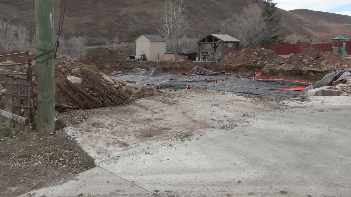 The remains of the Phelps home in Heber City, Monday. A remodel revealed black mold in many places of the home, leading to the family tearing it down.