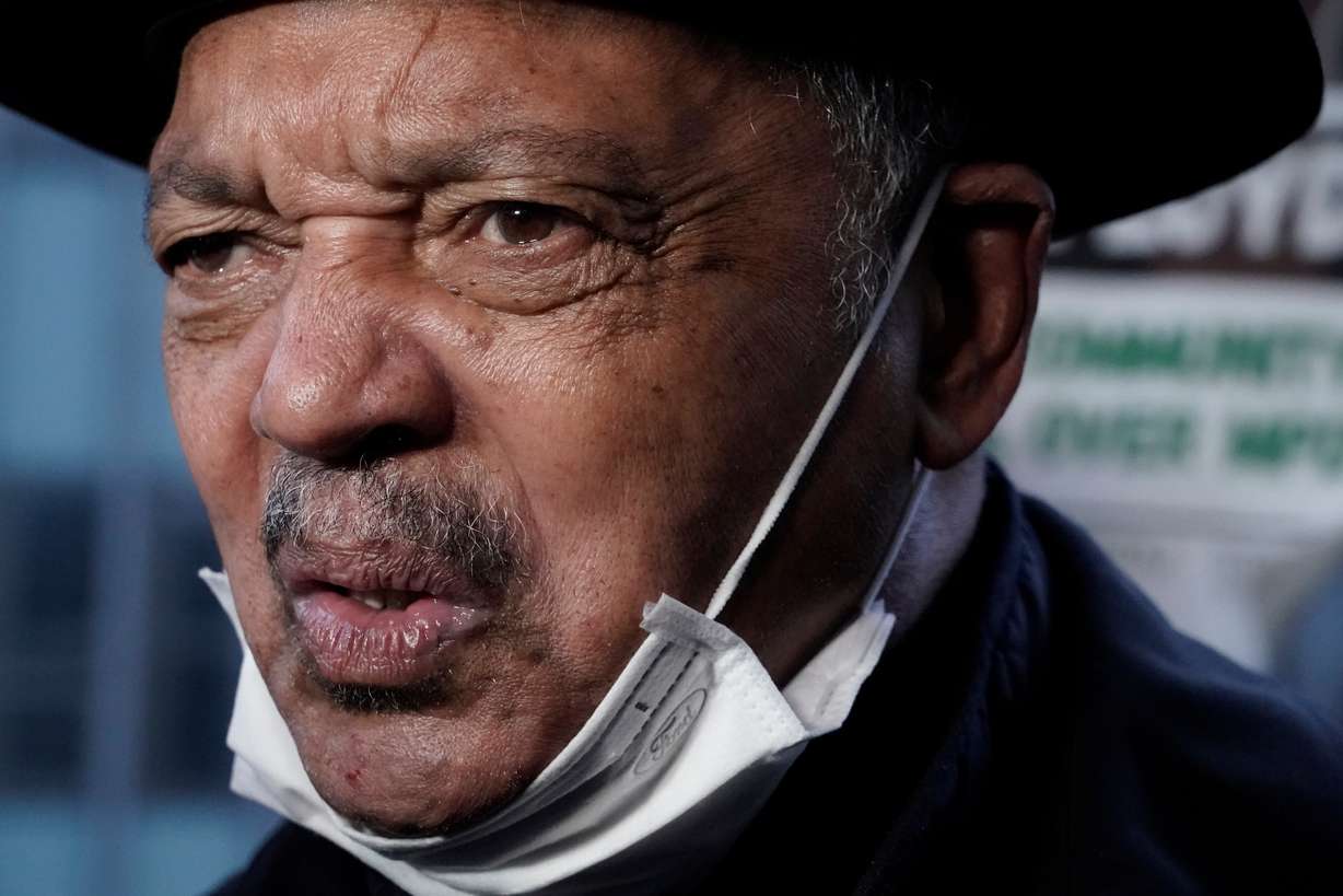 Rev. Jesse Jackson answers questions at a rally, April 19, 2021, in Minneapolis, as the murder trial against the former Minneapolis police Officer Derek Chauvin in the killing of George Floyd advances to jury deliberations.