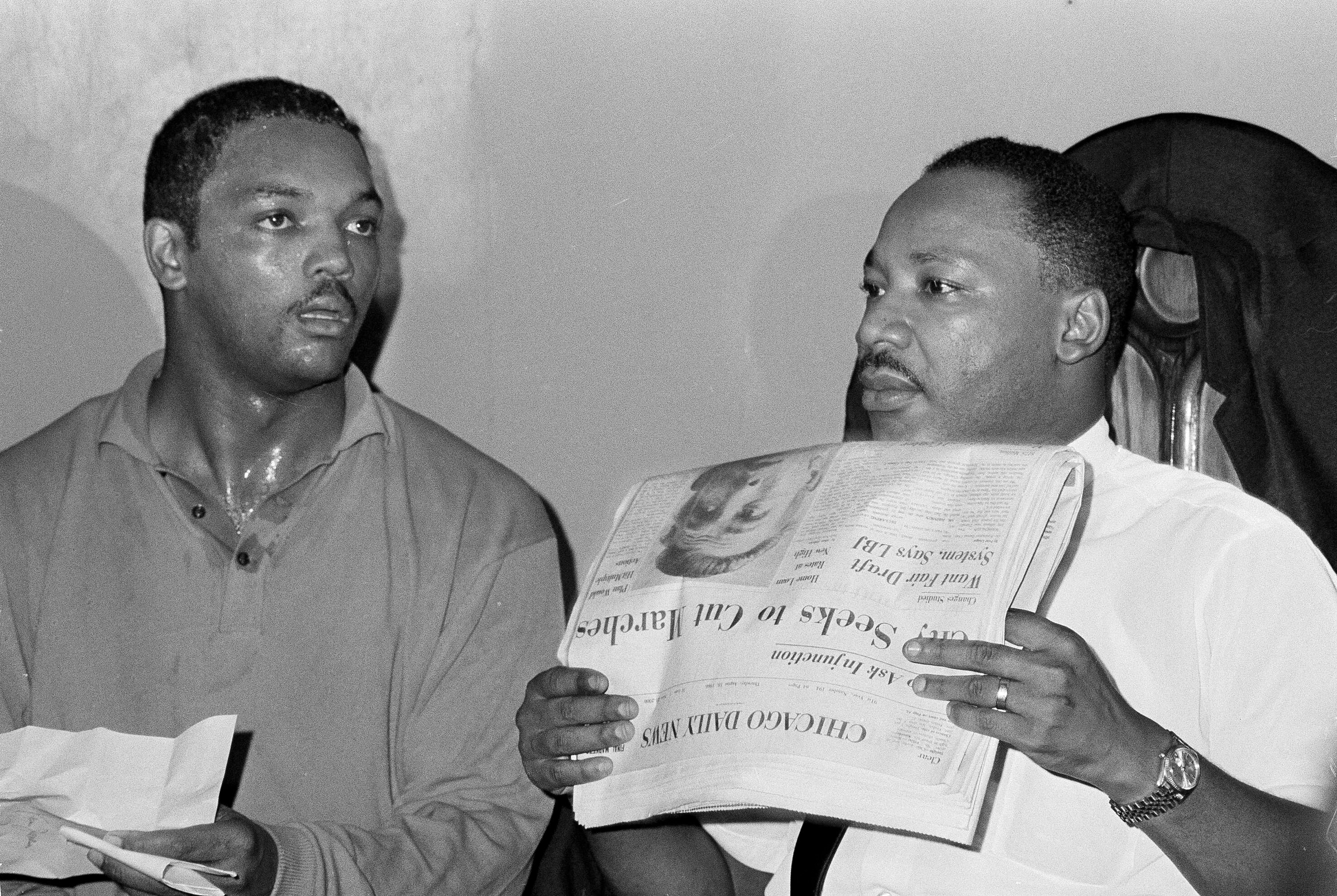 Civil rights leader Dr. Martin Luther King, Jr., right, and his aide Rev. Jesse Jackson are seen in Chicago, Aug. 19, 1966.
