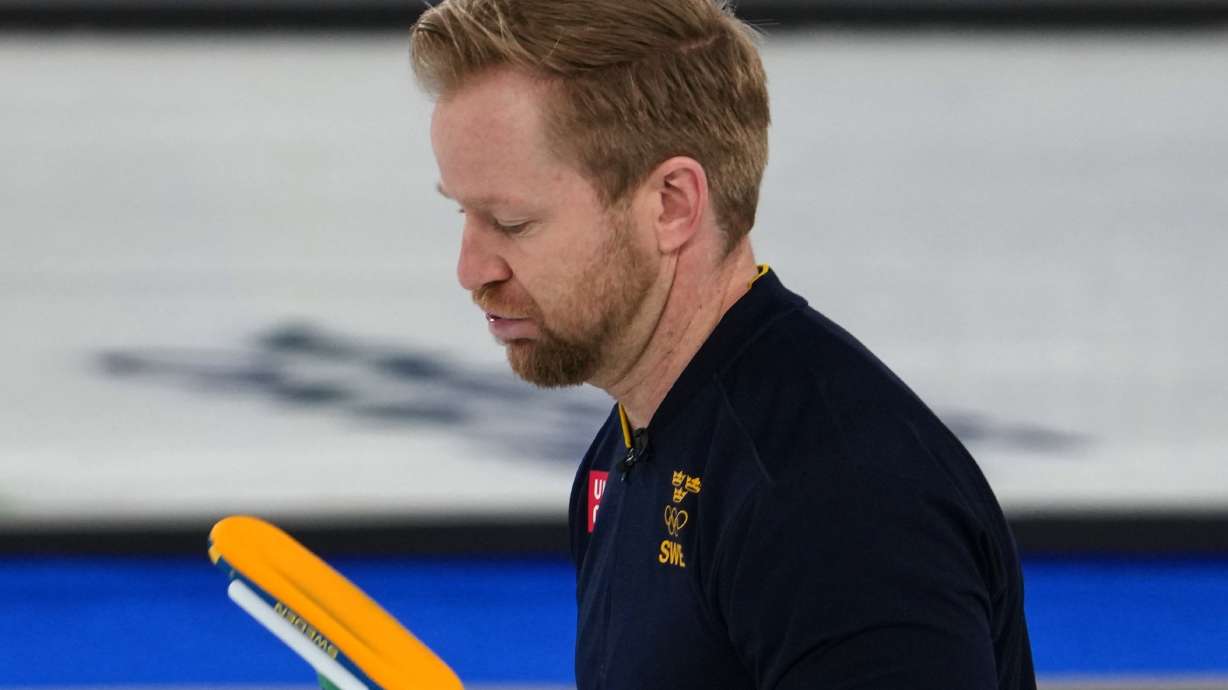 Sweden's Niklas Edin reacts after the men's curling round robin session against Germany, at the 2026 Winter Olympics, in Cortina d'Ampezzo, Italy, Monday, Feb. 16, 2026.