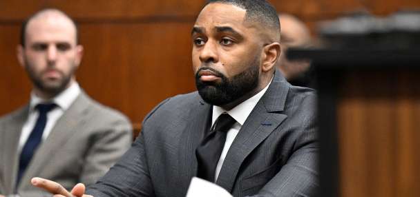 Judge grants hearing, expresses concerns ex-Michigan coach Moore may have had rights violated