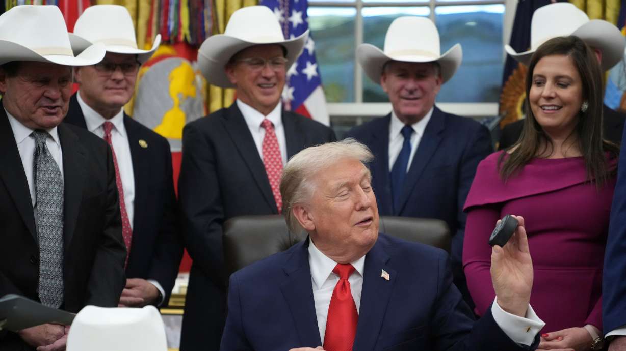 President Donald Trump at a bill signing ceremony with members of the 1980 U.S. men's Olympic hockey team, Dec. 12, at the White House in Washington. Speculation is rampant about Trump potentially attending the gold-medal game on Sunday.
