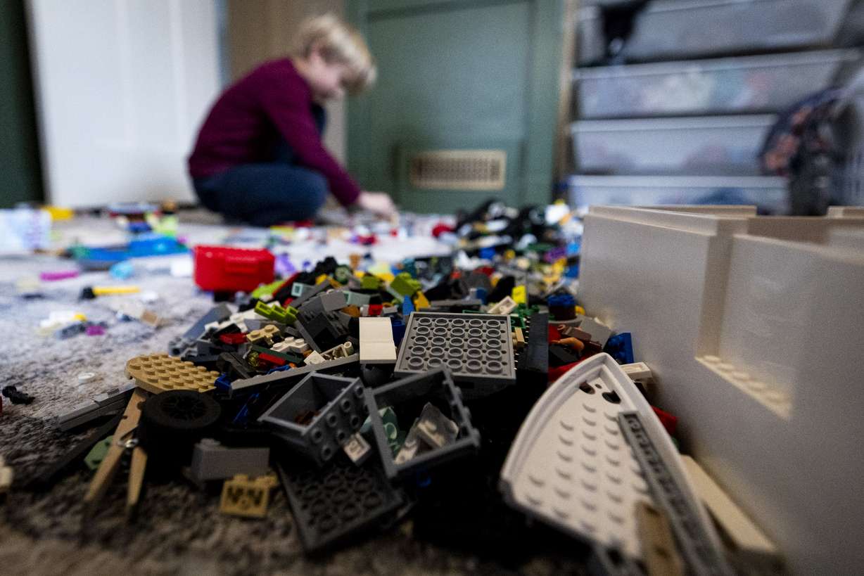 Atticus McDaniel, 7, plays with Legos in his room at his family’s home in Holladay on Wednesday. Emily Bell McCormick of the Policy Project said "it's not looking good for Utah families" in terms of child care.
