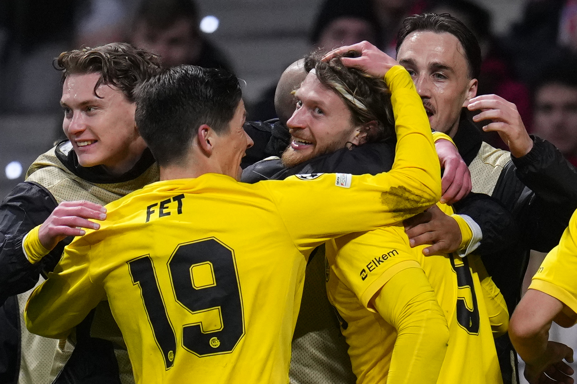 Glimt's Kasper Hogh, center, celebrates after scoring his side's second goal during the Champions League opening phase soccer match between Atletico Madrid and Bodo Glimt in Madrid, Spain, Wednesday, Jan. 28, 2026. 
