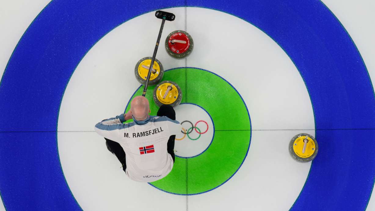 Norway's Magnus Ramsfjell looks over the stones during a men's curling round robin match against China at the 2026 Winter Olympics, in Cortina d'Ampezzo, Italy, Friday, Feb. 13, 2026.