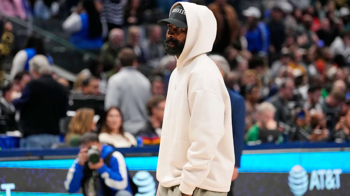 Dallas Mavericks guard Kyrie Irving stands on the court during a time ou in the second half of an NBA basketball game againt the Minnesota Timberwolves Wednesday, Jan. 28, 2026, in Dallas.