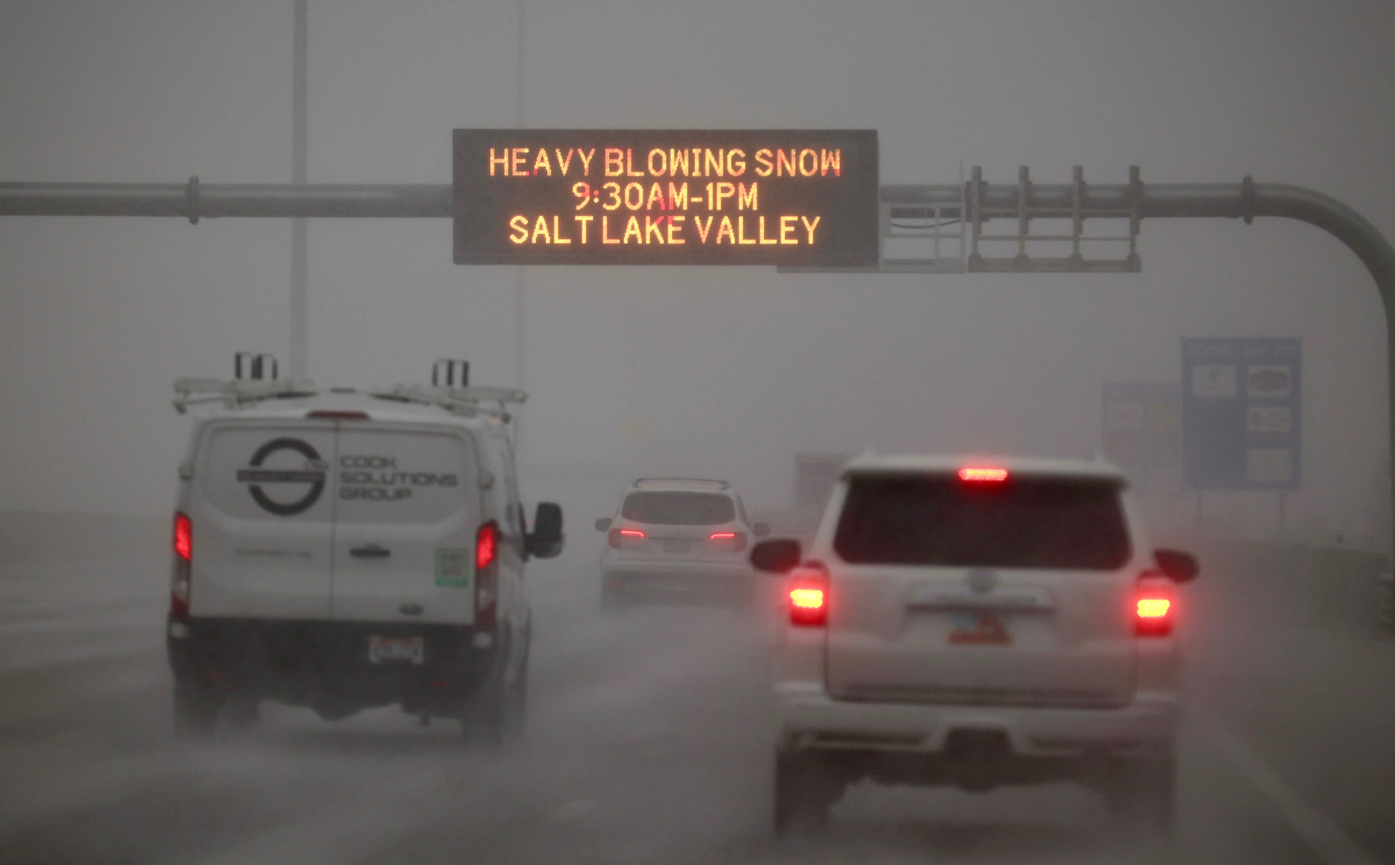 Heavy snow causes delays at airport, snow squall warnings and canyon restrictions