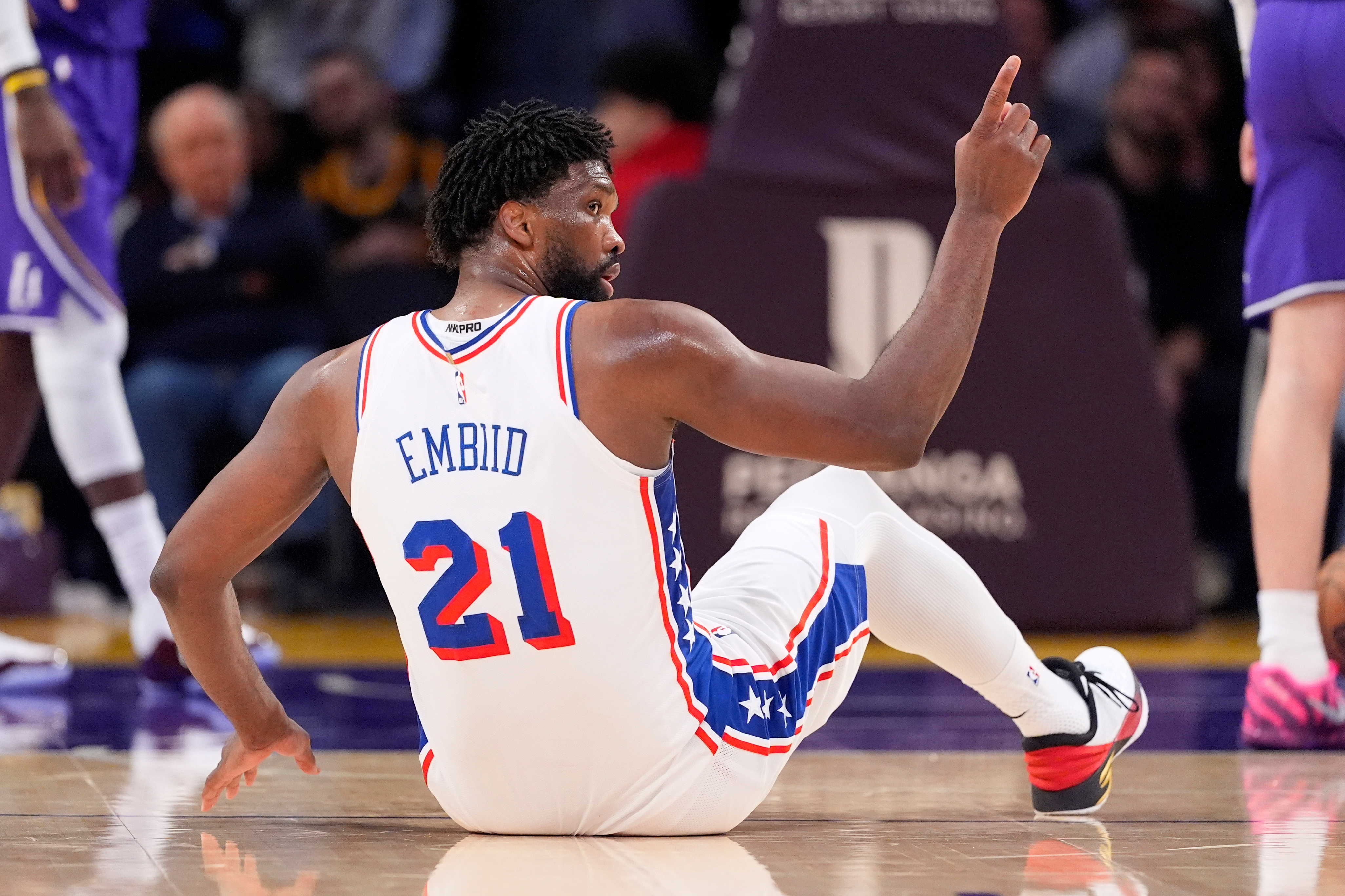 Philadelphia 76ers center Joel Embiid celebrates after scoring and drawing a foul during the second half of an NBA basketball game against the Los Angeles Lakers, Thursday, Feb. 5, 2026, in Los Angeles.