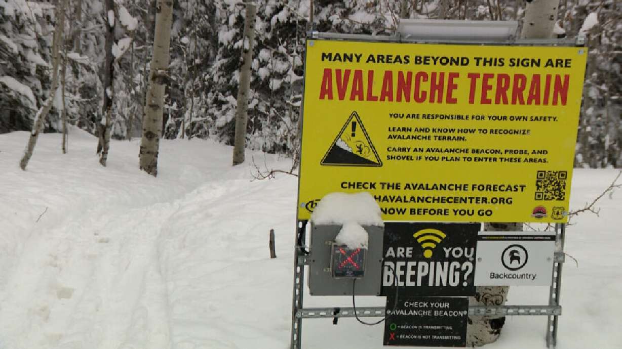 A sign at Little Cottonwood Canyon warns of avalanche dangers, Feb. 18. UDOT will close down part of the backcountry near Snowbird in Little Cottonwood Canyon to install remote avalanche control devices.