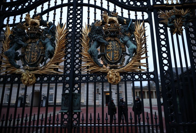 Police officers stand outside Buckingham Palace, following the arrest of Andrew Mountbatten Windsor, formerly known as Prince Andrew, on suspicion of misconduct in public office, after the U.S. Justice Department released more records tied to the late financier and convicted sex offender Jeffrey Epstein, in London, Britain, Thursday.